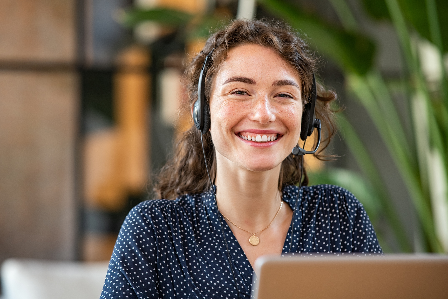 Successful Customer Service Agent Working at Office